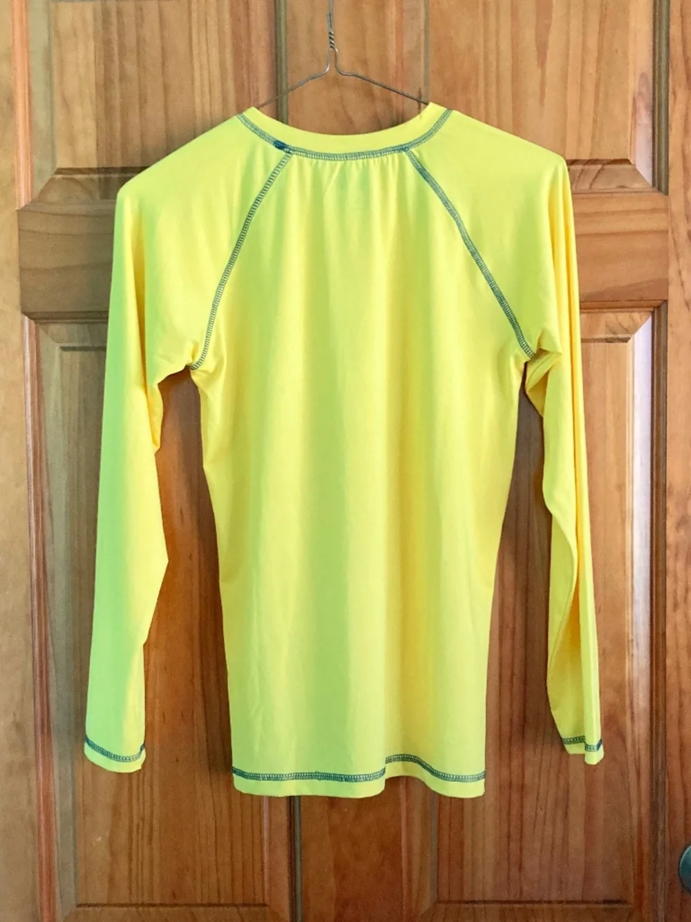 Boy’s size 12/14 Quad Seven banana yellow long sleeved swim shirt/rash guard